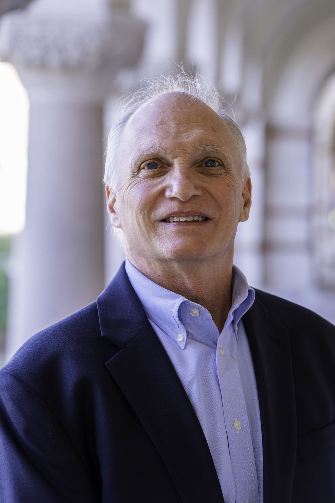 Skip York smiling, close portrait